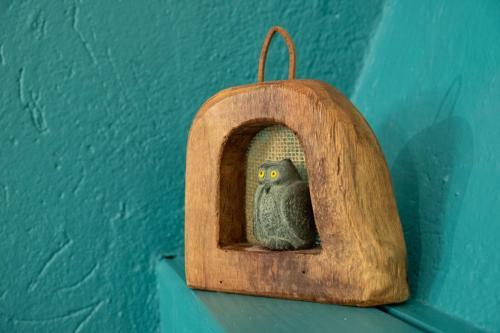 a figurine of an owl in a bird house at MEMA HOLIDAY HOME in Aosta