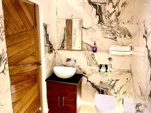Ванна кімната в Olive luxury apartment