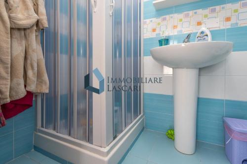 a bathroom with a sink and a shower at Villa Pietro in Lascari