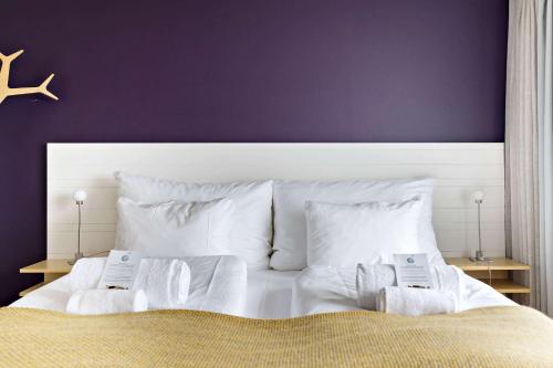 Кровать или кровати в номере Voksenasen Hotell; Best Western Signature Collection