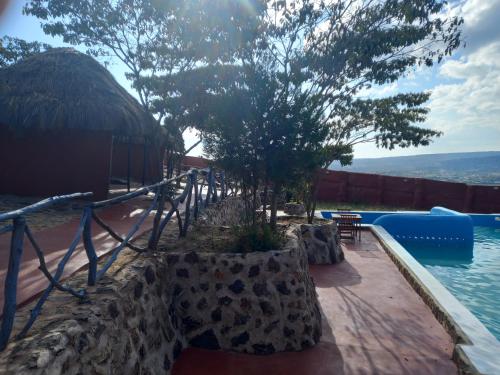 a view of the pool at a resort at Ngari Hill EcoLodge, Maralal - Kenya in Maralal