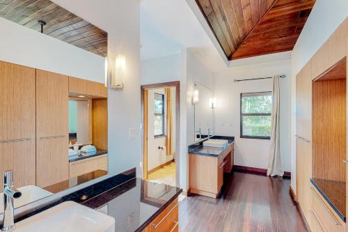 a kitchen with a sink and a counter top at Zumba House at The Reserve Gold Standard Certified in Hopkins