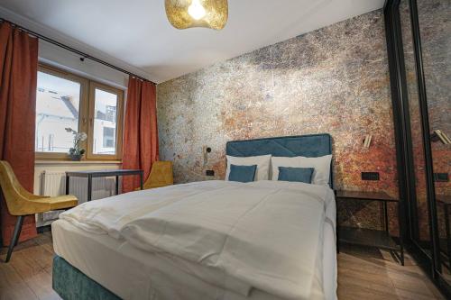 Posteľ alebo postele v izbe v ubytovaní Apartament Kilińskiego 17a,2
