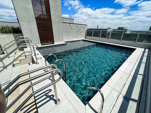 Bazén v ubytování Studios Cityhome Maxplaza Canoas nebo v jeho okolí