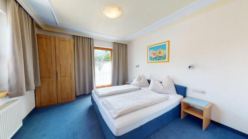 Cama o camas de una habitación en Appartements KALSWIRT