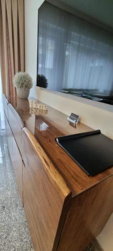 Televisyen dan/atau pusat hiburan di Bonsai-Apartment II