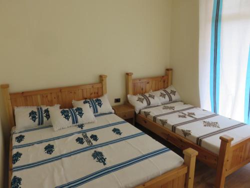 Postel nebo postele na pokoji v ubytování Christian Guest house