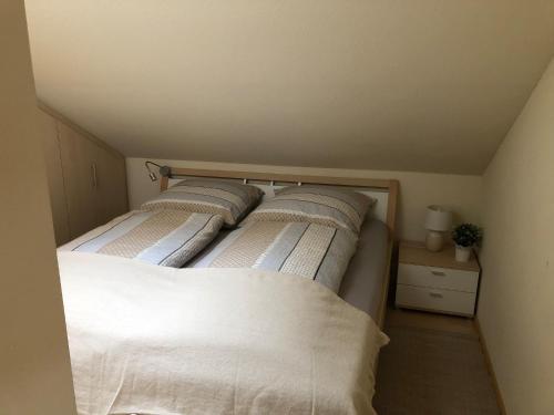 Postel nebo postele na pokoji v ubytování Fewo Seeresidenz auf Scheid