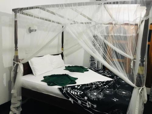 Кровать или кровати в номере Akash Villa
