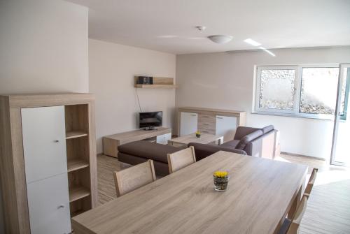 Posezení v ubytování Gästehaus und Fewo Lamm Garni