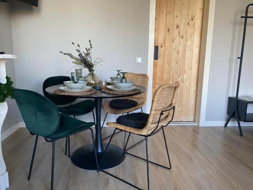 Φωτογραφία από το άλμπουμ του Statige boerderijwoning met vrij uitzicht en tuin σε Hoogzand