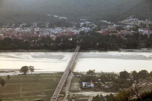 an aerial view of a bridge over a river at Hotel Alpana in Haridwār