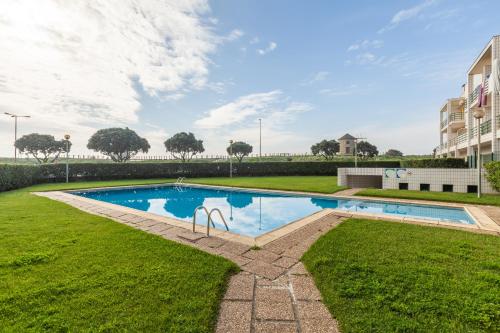 an image of a swimming pool in a yard at Casa da Apúlia - Minho's Guest in Esposende