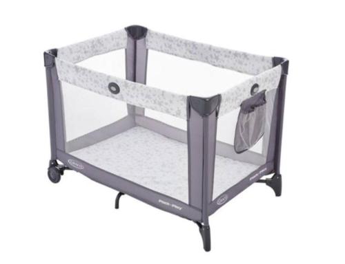 a metal utility cart with two shelves at Cozy Nordic Utopia, Bsmt Suite near WEM & DT, King Bed, WiFi in Edmonton