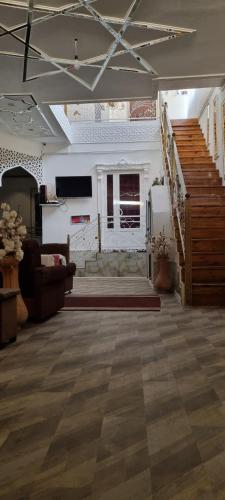 Kuvagallerian kuva majoituspaikasta Hotel Guest House GOLDEN DEGREZ, joka sijaitsee kohteessa Bukhara