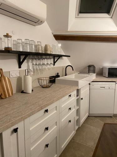 Virtuvė arba virtuvėlė apgyvendinimo įstaigoje T3 Kokon Lumineux & Chaleureux, Parking, Climatisation