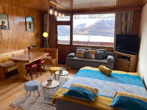 Photo de la galerie de l'établissement Appartement Cosy et convivial au pied des pistes., à Orcières