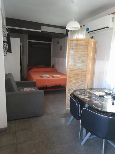 Ένα ή περισσότερα κρεβάτια σε δωμάτιο στο La Rosa Apart