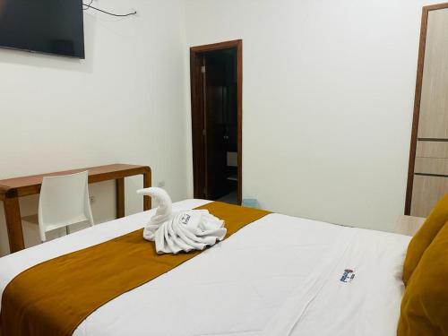 Postel nebo postele na pokoji v ubytování Hotel Overland