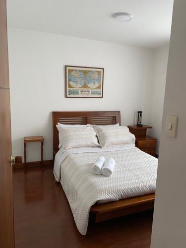 Ένα ή περισσότερα κρεβάτια σε δωμάτιο στο CÓMODO Y CENTRAL APARTAMENTO