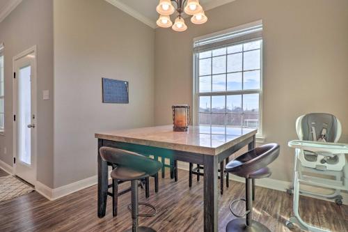 a dining room with a table and chairs at China Spring Home about 13 Mi to Downtown Waco! in China Springs