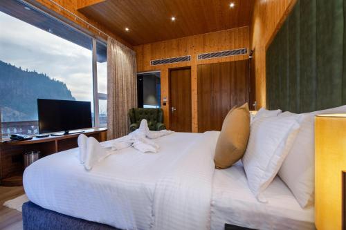 Televisyen dan/atau pusat hiburan di Palchan Hotel & Spa - A member of Radisson Individuals Retreats