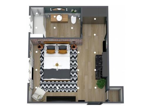 uma planta do piso de um quarto com uma cama em Newly Refurbished Luxury Hotel Style Accommodation em Milton Keynes