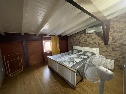 Postel nebo postele na pokoji v ubytování O'Chalet des îles