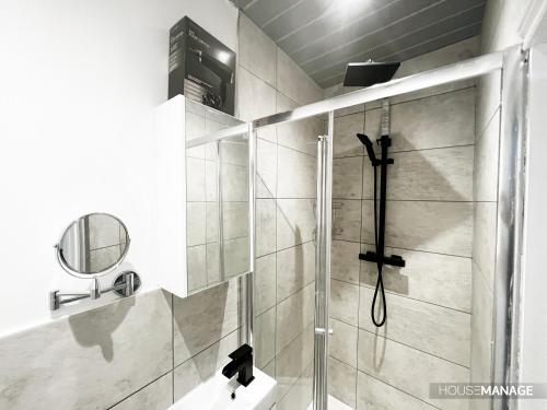 a bathroom with a shower and a sink at Erin Court Mansion - RM 11 in Croydon