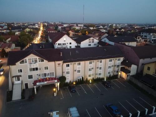 an aerial view of a city at night at Hotel Arizona in Timişoara