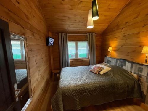 Postel nebo postele na pokoji v ubytování LA CABANE A INGALLS