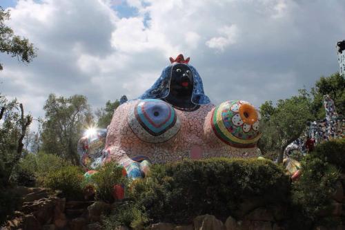 a large elephant statue with a chicken on it at Le case di Anita in Toscana -Capalbio in Capalbio