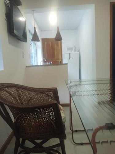 Televisyen dan/atau pusat hiburan di Vila da Sol Itaipava casas e estúdios