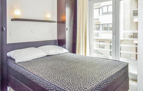 Postel nebo postele na pokoji v ubytování Zeezicht Ref 232