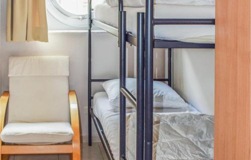 Двухъярусная кровать или двухъярусные кровати в номере Zeezicht Ref 232