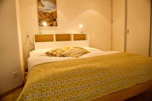 Ένα ή περισσότερα κρεβάτια σε δωμάτιο στο Haus Allegra Panorama