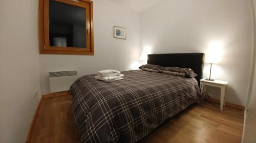 Posteľ alebo postele v izbe v ubytovaní Lovely spacious apartment (+garage) in La Plagne