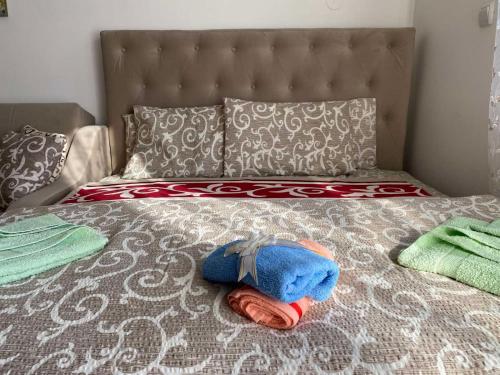 Ліжко або ліжка в номері Apartman Mima
