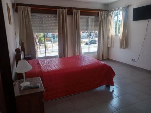 Postel nebo postele na pokoji v ubytování Departamentos Santiago