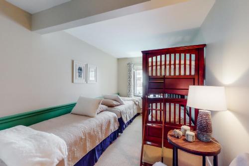 a bedroom with a bed and a book shelf at Mountain's Edge in Brownsville