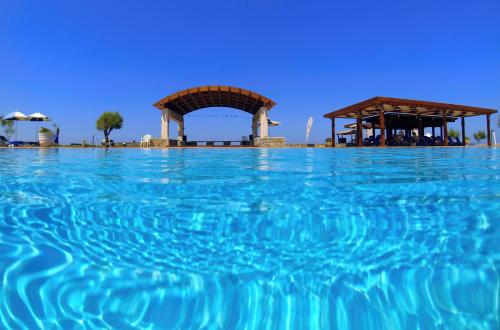 Πισίνα στο ή κοντά στο Sirens Beach& Village