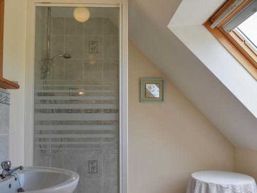 a bathroom with a shower and a sink at Dairy Cottage - Uk37833 in Pillaton