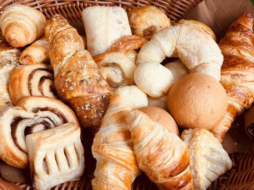 a basket filled with different types of pastries at Nikko Akarinoyado Villa Revage in Nikko