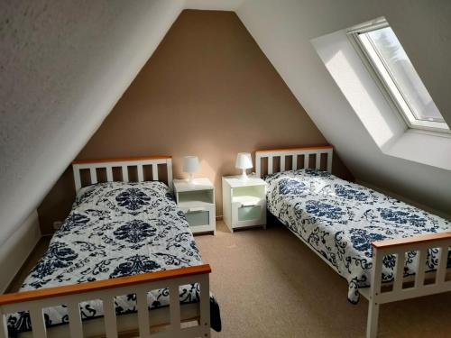 A bed or beds in a room at Ferienhaus Groß Grönau