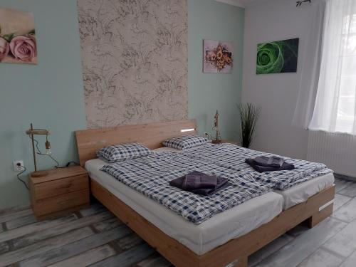 Posteľ alebo postele v izbe v ubytovaní Crystal Apartman
