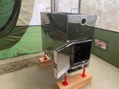 a small machine on display in a room at Yadoya YADOKARI in Pippu