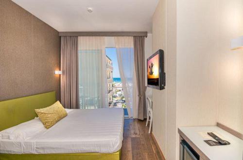 Postel nebo postele na pokoji v ubytování Hotel Bracciotti