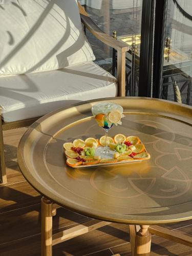 a tray of food on a table on a table at Al Maha Int Hotel Oman in Muscat