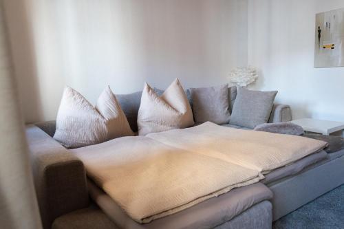 Una cama o camas en una habitación de Apart Anne