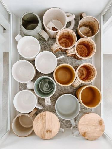 a bunch of pots and pans in a drawer at Okt Häus in Nordegg